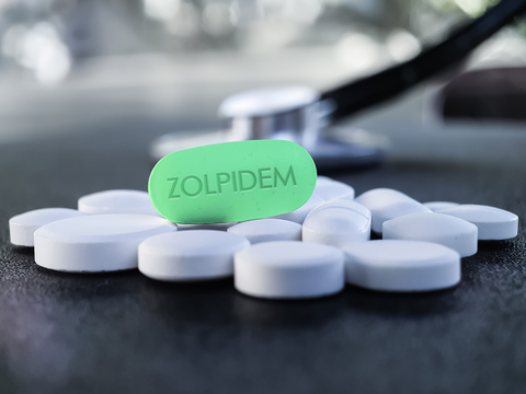 Medication for the treatment of sleeplessness The picture shows a a few tablets of Zolpidem